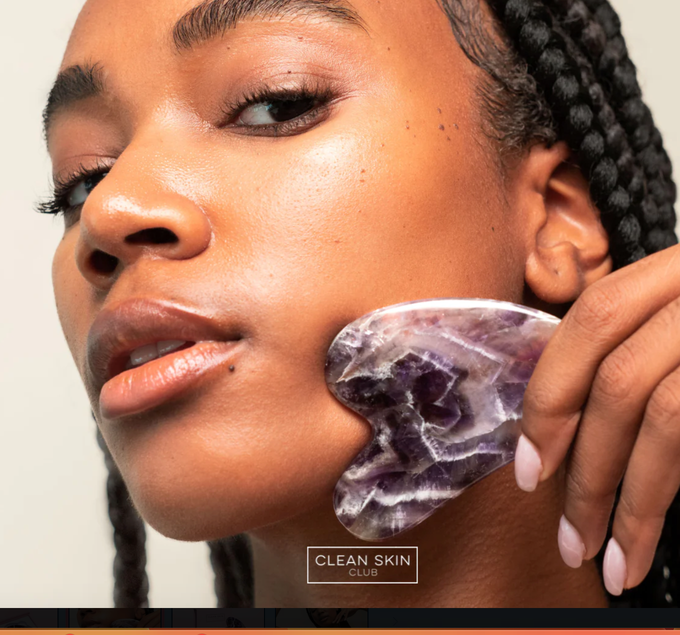 a woman with braids is holding a piece of soap